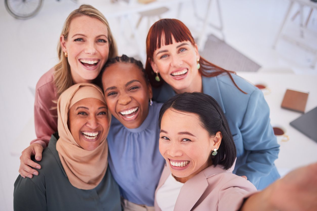 Diversity, face and team of empowered business women smile for picture in support of collaboration.